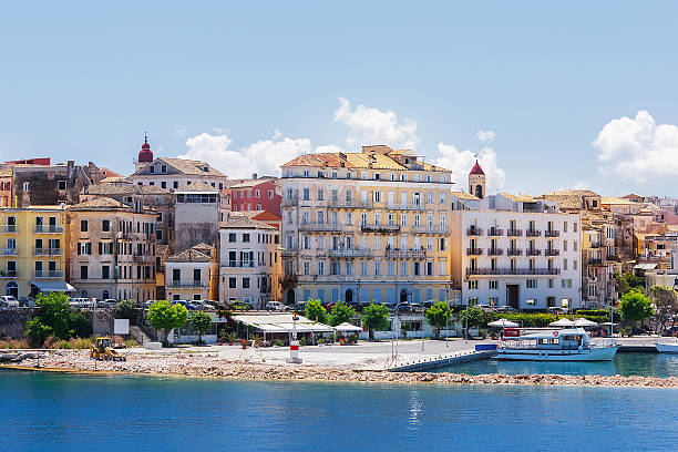 Corfu, capital town of Corfu island A view of Corfu Town, the capital of the island of Kerkyra, or Corfu, seen from the sea corfu town stock pictures, royalty-free photos & images