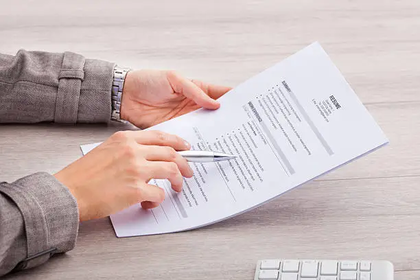 Photo of Businesswoman Holding Contract Paper