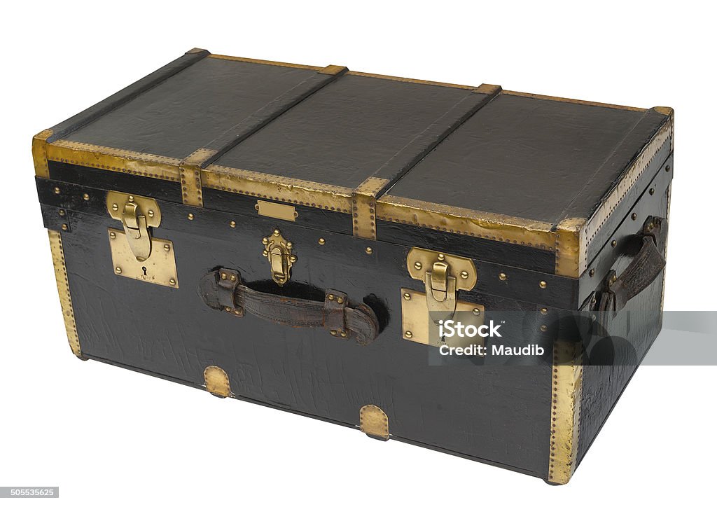 Antique steamer trunk, isolated Antique steamer trunk in brass and wood custom made in Paris before WWII, isolated Trunk - Furniture Stock Photo