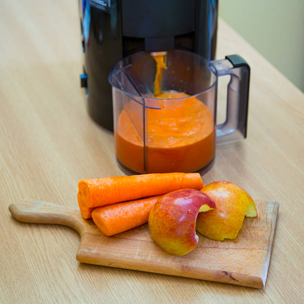 istock Carrot and apple juice 505536051