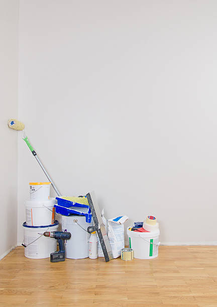 istock Room repairs. Cans with paints, roller, screwdriver. 505536339