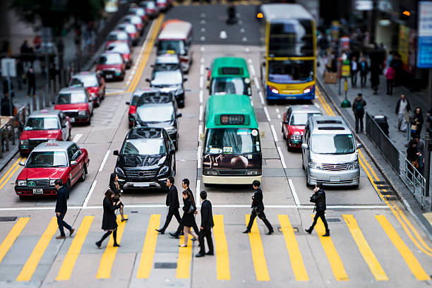 istock People crossing street 505536828