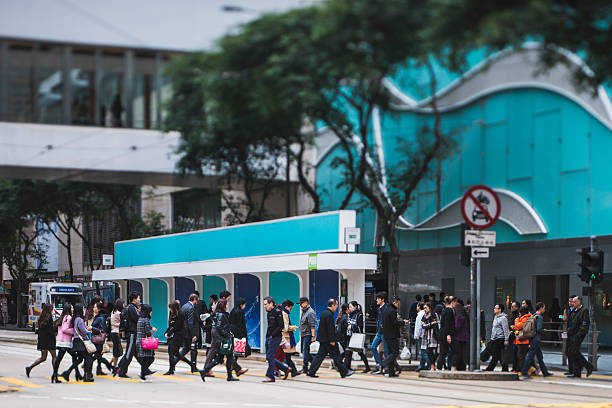 istock People crossing street 505536898