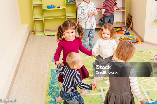 Group Of Little Children Dancing Stock Photo - Download Image Now - Child, Circle, Indoors