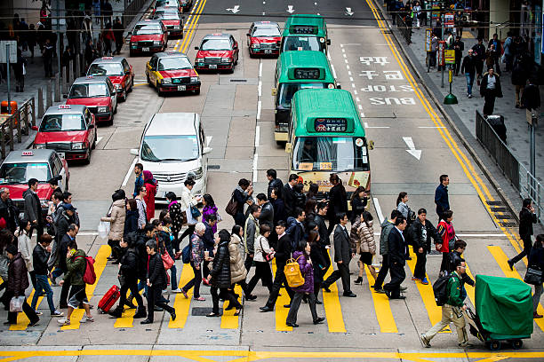 istock People crossing street 505537134