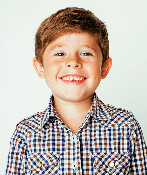 istock little cute real boy on white background gesture smiling close 505537486