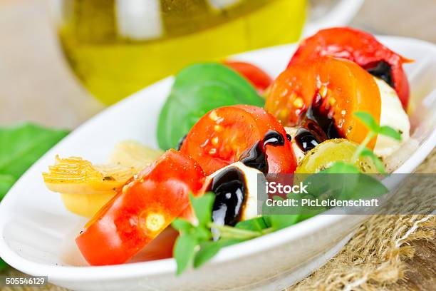 Tomato Salad Stock Photo - Download Image Now - Appetizer, Artichoke, Basil