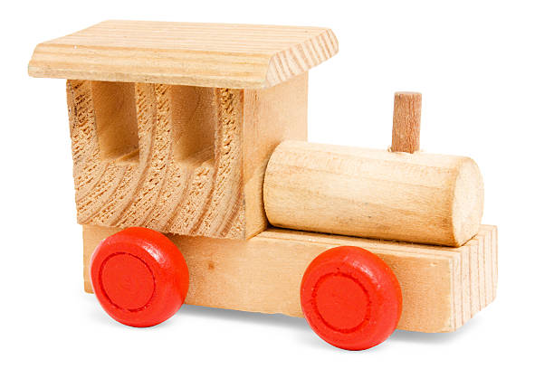 istock wooden train toy with red wheels 505549411