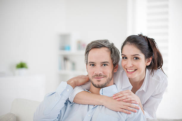 istock Couple at home relaxing in sofa 505549751