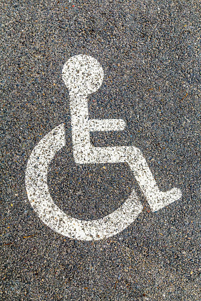istock Disabled parking permit sign on the street 505563155