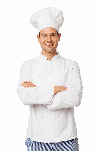 Confident Chef In Uniform Standing Arms Crossed Portrait of confident chef in uniform standing arms crossed over white background. Vertical shot. chefs whites stock pictures, royalty-free photos & images