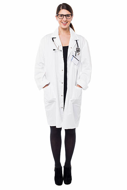 istock Female physician posing with hands in lab coat 505567403