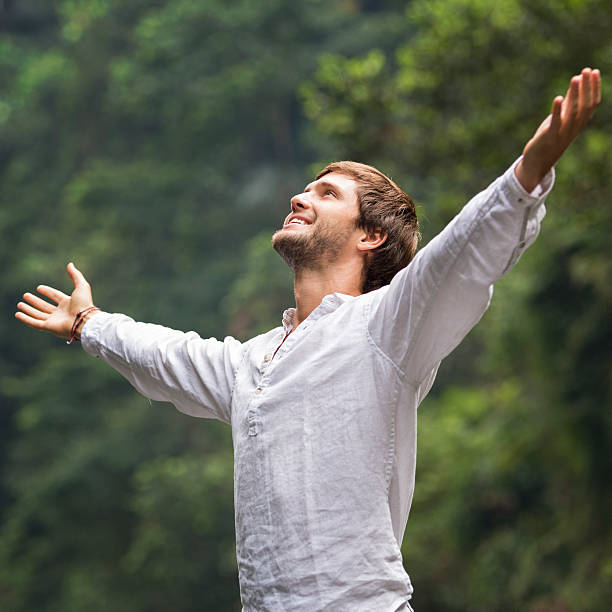 istock Young bearded man enjoying life and feeling free 505568011