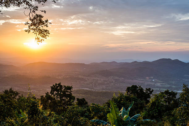 istock Light of sunset with mountains background in thailand 505570690
