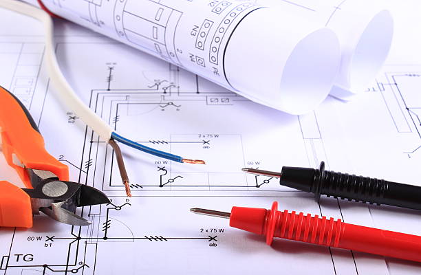 istock Cables of multimeter, pliers, electric wire and construction drawing 505571460