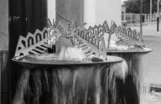Over flowing water  fish fountain fond in Napier City, New Zealand.