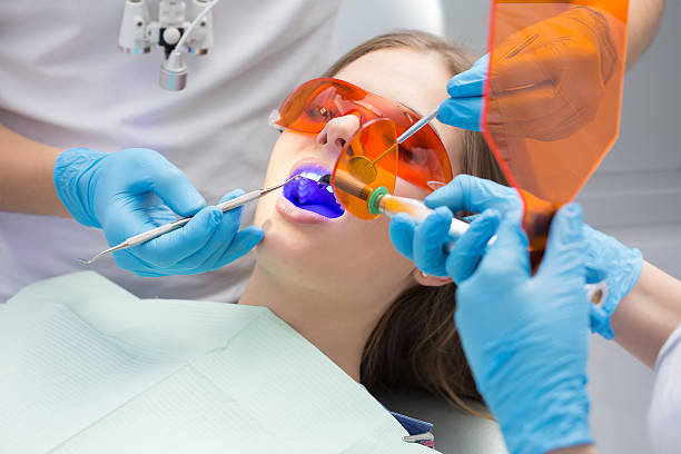 Tooth filling ultraviolet lamp stock photo