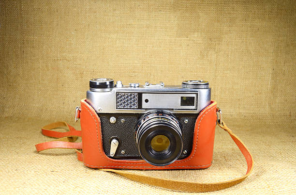 istock old vintage camera closeup on canvas 505573142