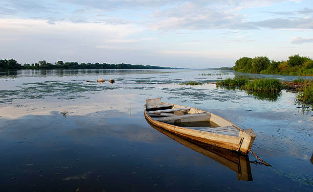 istock The flooded wooden boat 505577018