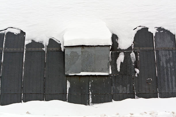 istock Metal hangar in snow. 505577900