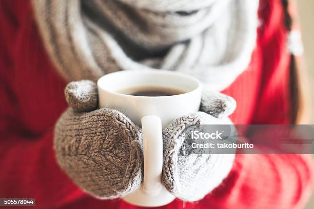 Woman Hands In Gloves Holding A Mug Stock Photo - Download Image Now - Cold Temperature, Weather, Glove