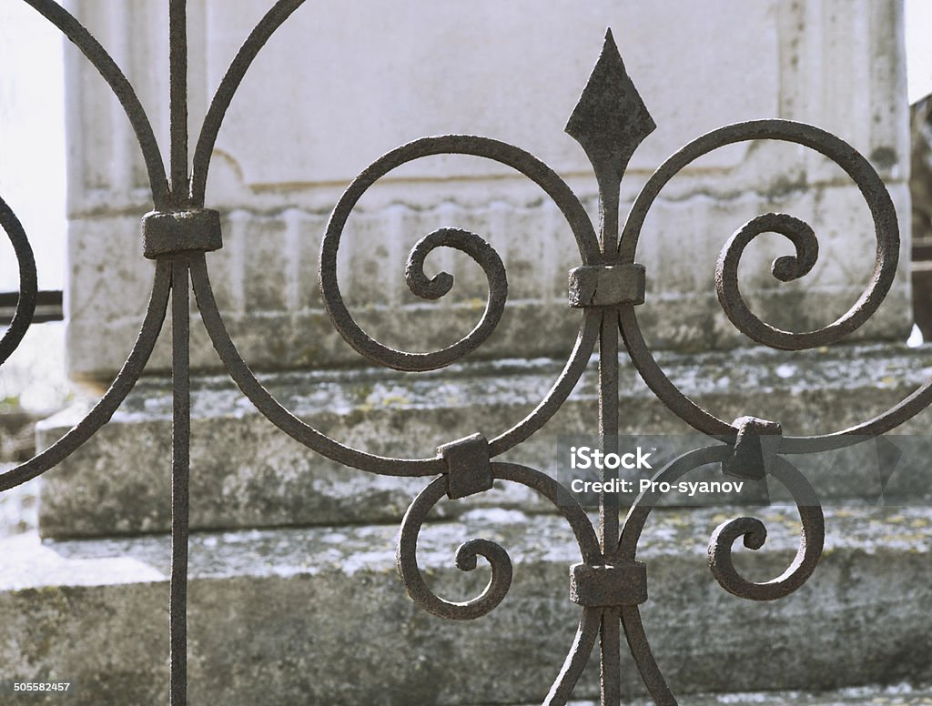 Old iron decorative grille Old iron decorative grille on the front of the tomb of the old Russian Orthodox cemetery  Architecture Stock Photo