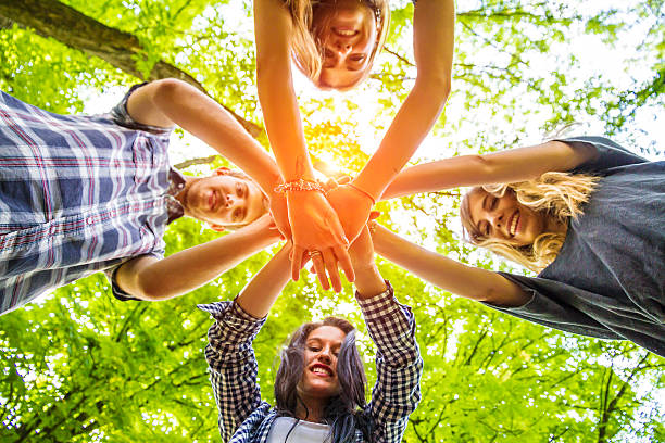 istock Group of friends with hands in hands - Teamwork 505583103