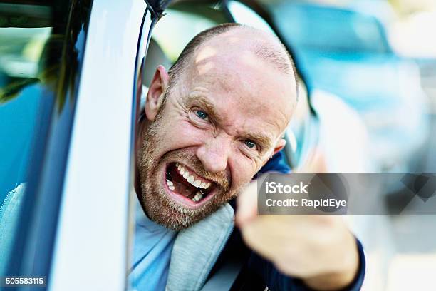 Enraged Driver Face A Mask Of Fury Loses His Temper Stock Photo - Download Image Now