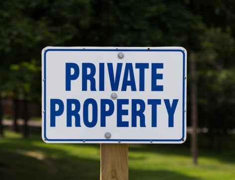 Closeup to a Private Property Sign during the day