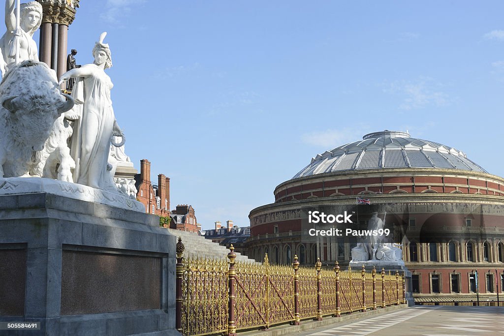 Statues and fence of memorial overlooking  Hall Statues and fence of memorial overlooking Albert Hall Architectural Dome Stock Photo