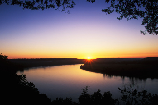 Beautiful sunrise over the Ohio River as seen from Otter Creek Start Park, Kentucky, USA