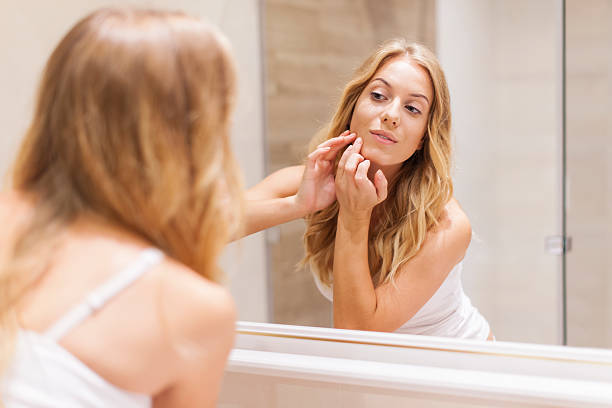 istock Blonde woman has problems with skin on the face 505586079