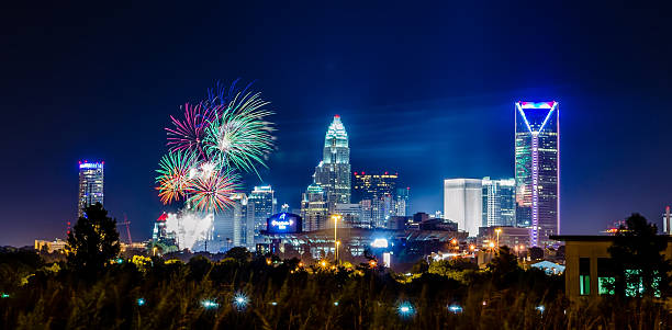4th of july firework over charlotte skyline stock photo