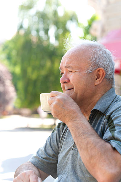 istock happy grandfather drinking morning coffee 505586679