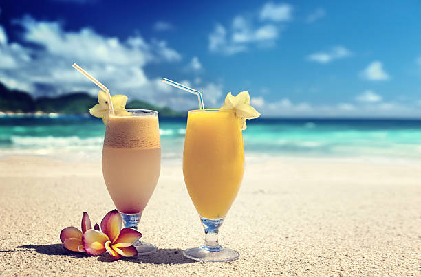 fresh fruit juices on a tropical beach