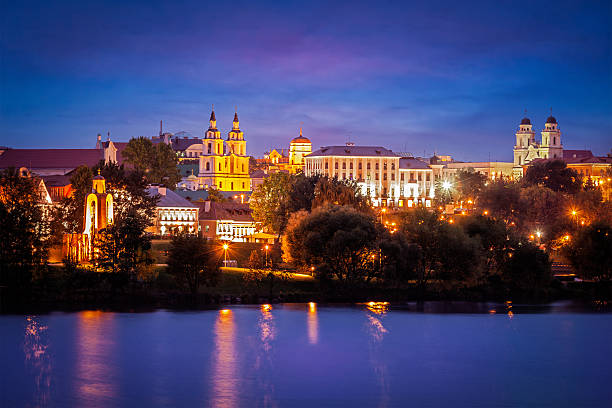 Evening view of Minsk cityscape Evening view of Minsk cityscape with Holy Spirit Cathedral over Svisloch River, Belarus minsk stock pictures, royalty-free photos & images