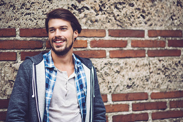 istock Portrait of smiling young man 505593876
