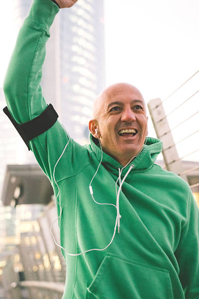 istock Cheerful Mature Man Running Outdoors Wearing Sport Clothes 505594120