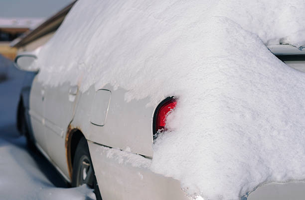 istock snowed in car after heavy snowfall 505598100