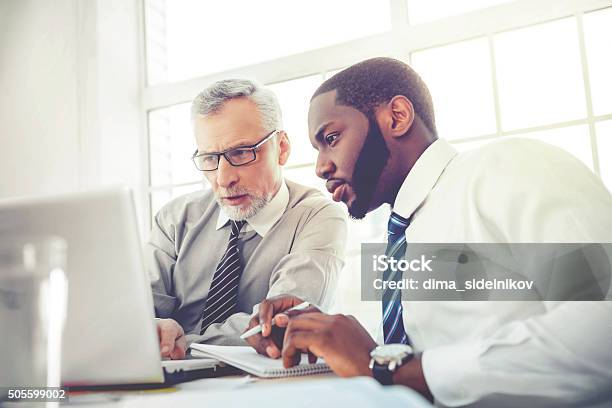 Concept For Teamwork And Knowledge Transfer Stock Photo - Download Image Now - Senior Adult, Leadership, Finance