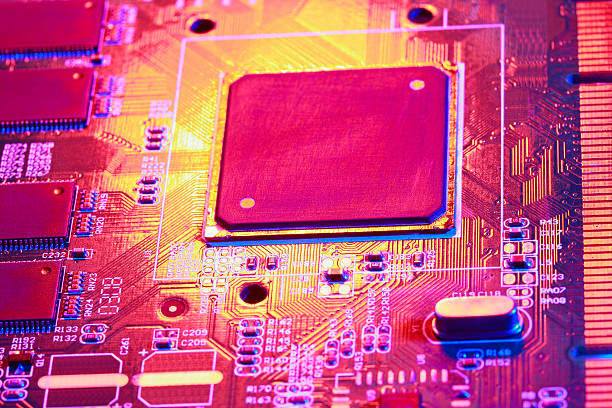 istock Gold yellow with red light of circuit board with processor close-up 505599102