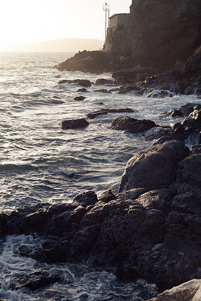 istock Sea Waves on the Rocks at Sunset 505599550