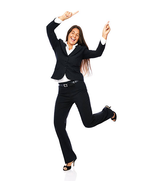 istock Celebrating businesswoman dancing 505599927