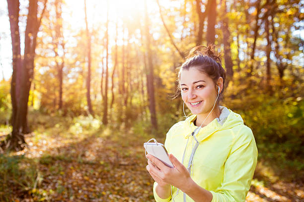 istock Young woman running 505600206