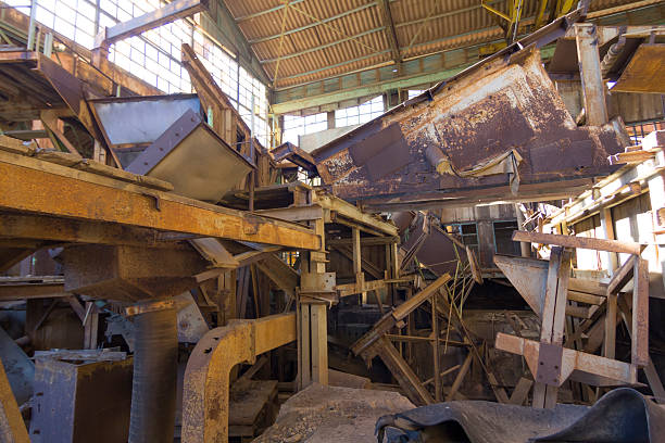 istock machinery destroyed in a coal mine abandoned after the war 505600541
