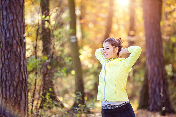 istock Young woman running 505600654