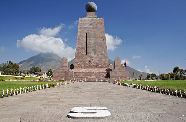 Middle of the World Pichincha, Ecuador - December 23, 2013: The view from the southern side of the monument at the Middle of the World outside of Quito in the Andes Mountains. equator line stock pictures, royalty-free photos & images