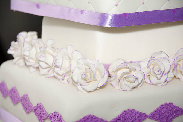 istock White and Purple Wedding Cake 505601649