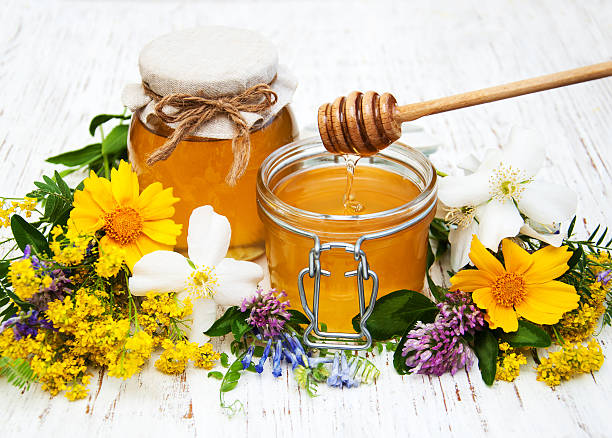 istock Honey and wild flowers 505601942