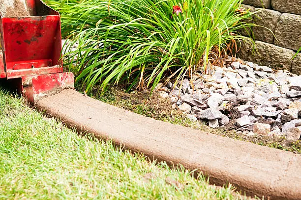 Photo of Installing Concrete Edging / Curbing Between Lawn and Landscaping